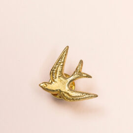 Broche zwaluw verguld