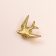 Broche zwaluw verguld