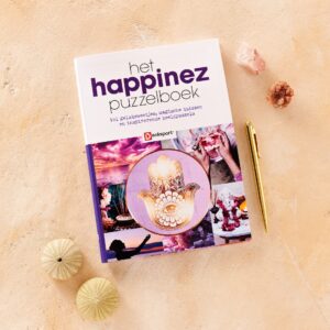 Daag je geest uit met het Happinez Puzzelboek